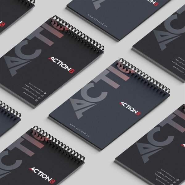 Spiral-bound notepads with bold Action8 branding and “TACTICAL” design for professional stationery and promotional gifting in Saudi Arabia